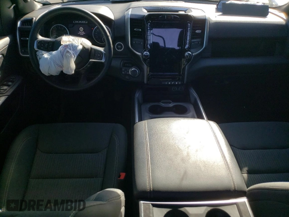 2024 Ram 1500 Big Horn with VIN 1C6SRFFTXRN211250, listed as a Copart auction lot 49993935 with 18,528 mi miles and Salvage title. Bid and sale history available at DreamBid. Image 8.