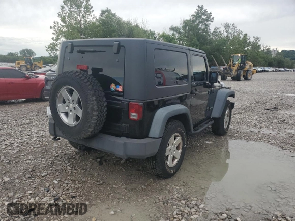 2010 Jeep Wrangler Rubicon with VIN 1J4BA6D14AL198524, listed as a Copart auction lot 65260235 with Not provided miles and Clean title. Bid and sale history available at DreamBid. Image 3.