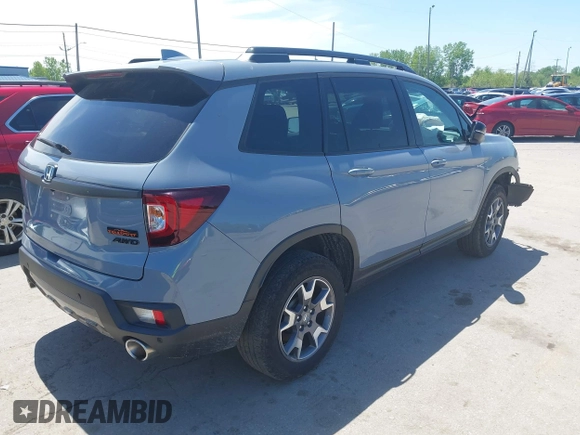 2022 Honda Passport TrailSport with VIN 5FNYF8H6XNB023013, listed as a IAAI auction lot 42274071 with 31,471 mi miles and . Bid and sale history available at DreamBid. Image 4.