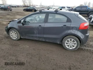 2015 Kia Rio LX with VIN KNADM5A31F6981115, listed as a Copart auction lot 49988525 with 195,373 mi miles and Salvage Title. Bid and sale history available at carsss.com. Image 2.