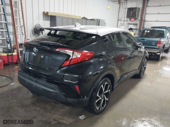2020 Toyota C-HR LE with VIN JTNKHMBX2L1086683, listed as a IAAI auction lot 41572864 with 75,711 mi miles. Bid and sale history available at carsss.com. Image 4.
