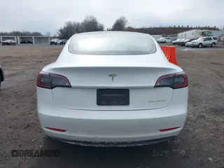 2023 Tesla Model 3 Long Range with VIN 5YJ3E1EB8PF600291, listed as a IAAI auction lot 41651156 with 37,055 mi miles and . Bid and sale history available at DreamBid. Image 15.