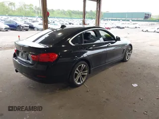 2016 BMW 4 Series 428i xDrive with VIN WBA4C9C58GG139151, listed as a IAAI auction lot 42151827 with 92,698 mi miles and . Bid and sale history available at DreamBid. Image 4.