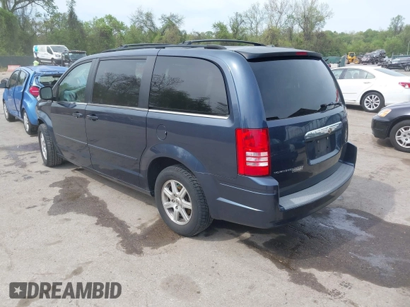 2008 Chrysler Town & Country Touring with VIN 2A8HR54P18R612733, listed as a IAAI auction lot 42113549 with 28,437 mi miles and . Bid and sale history available at carsss.com. Image 3.