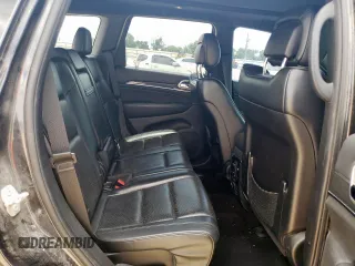 2016 Jeep Grand Cherokee Overland z VIN 1C4RJFCG8GC316271, wystawiony jako Copart lot #57245065 z przebiegiem 125 820 mil mil oraz Szkoda całkowita • Salvage title. Historia ofert i sprzedaży dostępna na DreamBid. Obrazek 11.