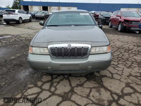 2000 Mercury Grand Marquis LS z VIN 2MEFM75WXYX742065, wystawiony jako Copart lot #57655795 z przebiegiem 175 070 mil mil oraz Tytuł czysty. Historia ofert i sprzedaży dostępna na DreamBid. Obrazek 5.
