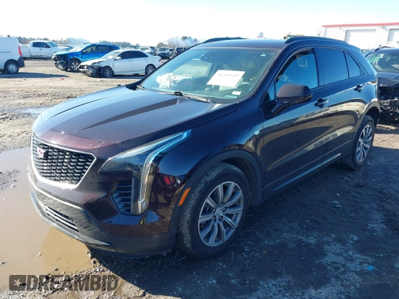 2020 Cadillac XT4 FWD Sport z VIN 1GYFZER40LF144503, wystawiony jako IAAI lot #41265649 z przebiegiem 79 120 mil mil oraz . Historia ofert i sprzedaży dostępna na DreamBid. Obrazek 17.