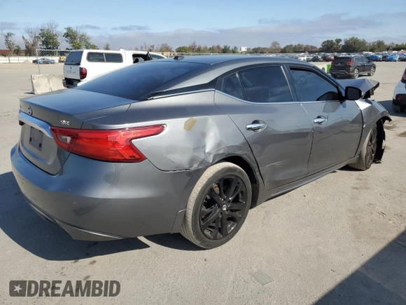 2016 Nissan Maxima S с VIN 1N4AA6AP9GC430964, выставлен на аукционе Copart как лот 85406374 с пробегом 143 020 миль миль и Списание • Salvage title. История ставок и продаж доступна на DreamBid. Изображение 3.
