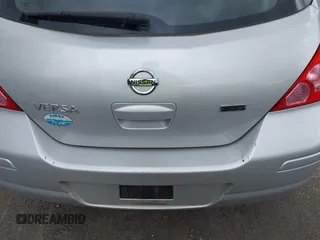 2012 Nissan Versa S z VIN 3N1BC1CP3CK267230, wystawiony jako IAAI lot #42369856 z przebiegiem 200 971 mil mil oraz . Historia ofert i sprzedaży dostępna na DreamBid. Obrazek 12.