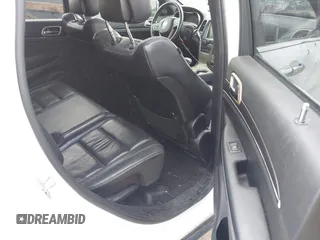 2014 Jeep Grand Cherokee Limited with VIN 1C4RJFBG5EC555128, listed as a IAAI auction lot 42129958 with 98,237 mi miles. Bid and sale history available at carsss.com. Image 8.