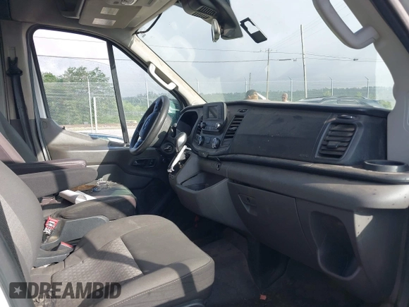 2020 Ford Transit Cargo z VIN 1FTBR1C87LKA51039, wystawiony jako IAAI lot #42212523 z przebiegiem 183 020 mil mil oraz . Historia ofert i sprzedaży dostępna na DreamBid. Obrazek 5.