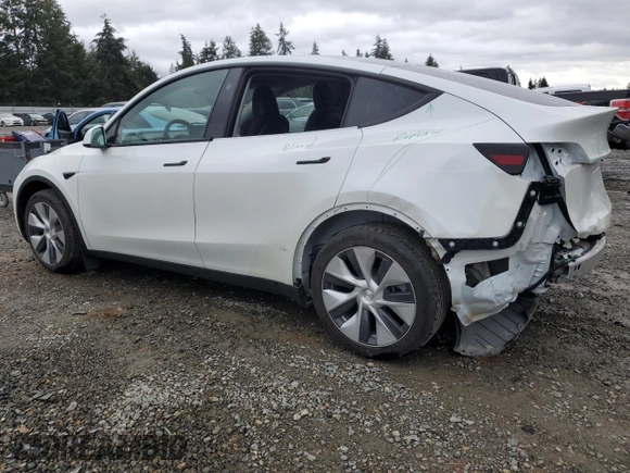 2023 Tesla Model Y Long Range z VIN 7SAYGDEE4PF836872, wystawiony jako Copart lot #45566235 z przebiegiem 7 674 mil mil oraz Szkoda całkowita • Salvage title. Historia ofert i sprzedaży dostępna na DreamBid. Obrazek 2.