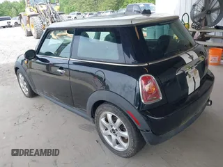 2010 MINI Hardtop with VIN WMWMF3C50ATZ26663, listed as a IAAI auction lot 42137470 with 106,894 mi miles and . Bid and sale history available at DreamBid. Image 3.