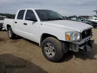 2005 Dodge Dakota SLT with VIN 1D7HE48N35S263600, listed as a Copart auction lot 46705555 with 128,519 mi miles and Salvage Title. Bid and sale history available at DreamBid. Image 4.