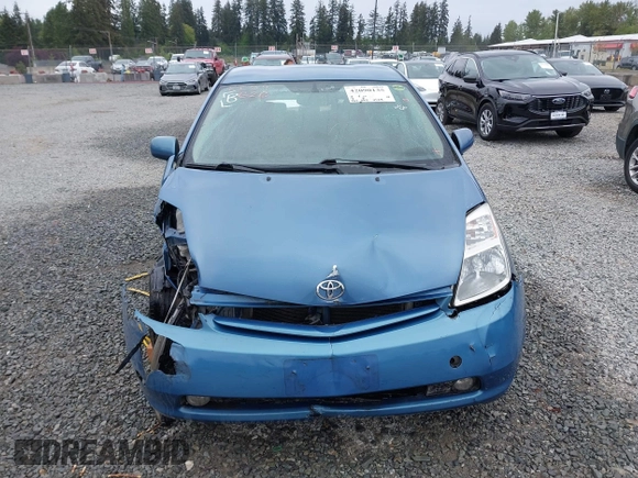 2005 Toyota Prius z VIN JTDKB20U150118440, wystawiony jako IAAI lot #42090135 z przebiegiem 263 095 mil mil oraz . Historia ofert i sprzedaży dostępna na DreamBid. Obrazek 12.
