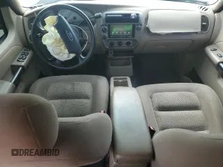 2004 Ford Explorer Sport Trac XLS z VIN 1FMZU77K24UB43103, wystawiony jako Copart lot #55955144 z przebiegiem 197 274 mil mil oraz Szkoda całkowita • Salvage title. Historia ofert i sprzedaży dostępna na DreamBid. Obrazek 8.