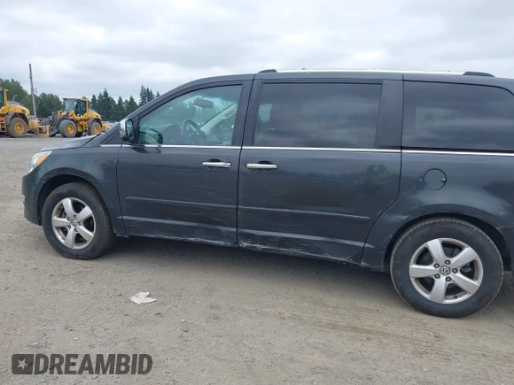 2011 Volkswagen Routan z VIN 2V4RW6DG5BR738696, wystawiony jako IAAI lot #42513978 z przebiegiem 180 933 mil mil oraz . Historia ofert i sprzedaży dostępna na DreamBid. Obrazek 6.
