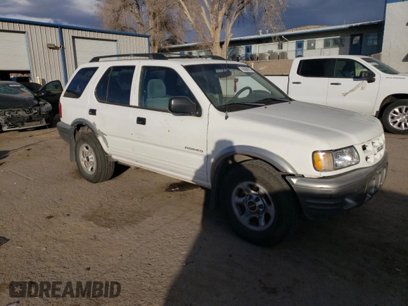 2002 Isuzu Rodeo S with VIN 4S2CK58W324314240, listed as a Copart auction lot 43694015 with 132,212 mi miles and Salvage title. Bid and sale history available at DreamBid. Image 4.