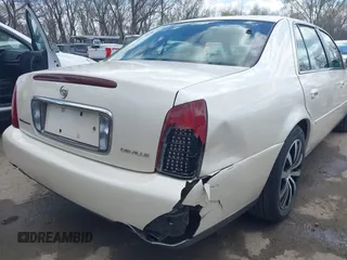 2003 Cadillac DeVille z VIN 1G6KD54Y13U208351, wystawiony jako IAAI lot #41889713 z przebiegiem 132 774 mil mil oraz . Historia ofert i sprzedaży dostępna na DreamBid. Obrazek 6.