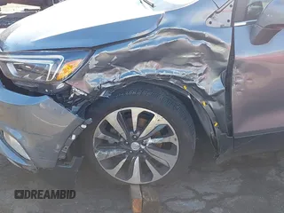 2019 Buick Encore Essence with VIN KL4CJGSM7KB927386, listed as a IAAI auction lot 40979134 with 77,784 mi miles. Bid and sale history available at carsss.com. Image 6.