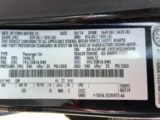 2014 Ford Fiesta Titanium z VIN 3FADP4FJXEM228098, wystawiony jako Copart lot #55173975 z przebiegiem 109 311 mil mil oraz Szkoda całkowita • Salvage title. Historia ofert i sprzedaży dostępna na DreamBid. Obrazek 13.