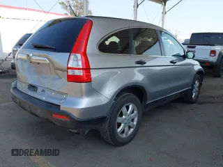 2007 Honda CR-V EX with VIN JHLRE38557C069515, listed as a IAAI auction lot 42121504 with 153,971 mi miles and . Bid and sale history available at carsss.com. Image 4.