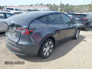 2022 Tesla Model Y Long Range z VIN 7SAYGDEE2NF447998, wystawiony jako IAAI lot #41704968 z przebiegiem 34 088 mil mil oraz . Historia ofert i sprzedaży dostępna na DreamBid. Obrazek 4.