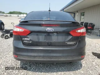 2014 Ford Focus Titanium with VIN 1FADP3J20EL347435, listed as a Copart auction lot 54947345 with 144,169 mi miles and Salvage title. Bid and sale history available at DreamBid. Image 6.
