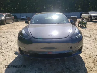 2023 Tesla Model 3 with VIN 5YJ3E1EA1PF664941, listed as a Copart auction lot 58097005 with 39,391 mi miles and Salvage title. Bid and sale history available at DreamBid. Image 5.