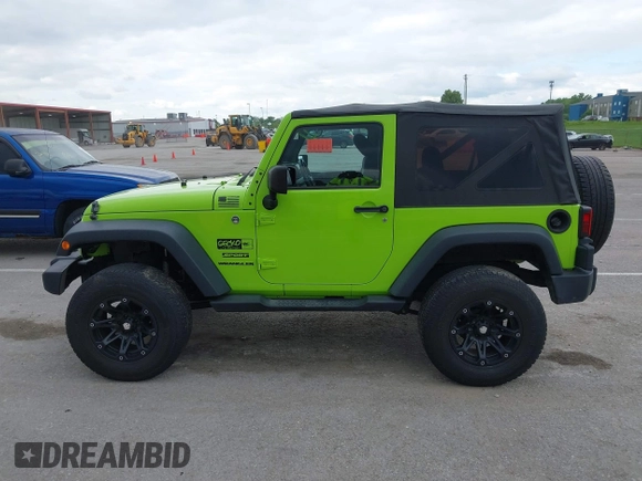 2013 Jeep Wrangler Sport with VIN 1C4AJWAG8DL507944, listed as a IAAI auction lot 42143144 with 70,085 mi miles and . Bid and sale history available at carsss.com. Image 14.