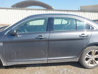 2015 Ford Taurus SEL z VIN 1FAHP2E80FG143819, wystawiony jako IAAI lot #42316114 z przebiegiem 103 959 mil mil oraz . Historia ofert i sprzedaży dostępna na DreamBid. Obrazek 14.