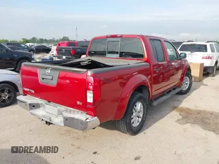 2014 Nissan Frontier SV with VIN 1N6AD0ER0EN749033, listed as a IAAI auction lot 42036166 with 152,276 mi miles and . Bid and sale history available at DreamBid. Image 4.
