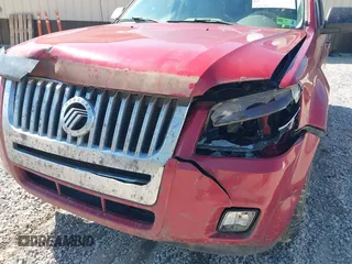 2011 Mercury Mariner with VIN 4M2CN8B77BKJ04817, listed as a IAAI auction lot 40493583 with 292,950 mi miles and . Bid and sale history available at DreamBid. Image 6.