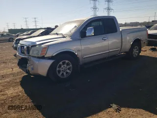 2004 Nissan Titan SE with VIN 1N6AA06AX4N506104, listed as a Copart auction lot 76545534 with 174,129 mi miles and Salvage Title. Bid and sale history available at carsss.com. Image 1.