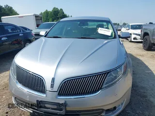 2013 Lincoln MKS with VIN 1LNHL9DK3DG614933, listed as a IAAI auction lot 42549445 with 313,182 mi miles and . Bid and sale history available at DreamBid. Image 12.
