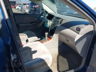 2008 Toyota Corolla CE with VIN 1NXBR32E58Z993844, listed as a IAAI auction lot 41603461 with 148,832 mi miles. Bid and sale history available at carsss.com. Image 5.
