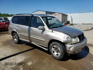 2002 Suzuki XL7 Standard z VIN JS3TY92V524108548, wystawiony jako Copart lot #56304705 z przebiegiem 288 201 mil mil oraz Nie do naprawy • Non repairable. Historia ofert i sprzedaży dostępna na DreamBid. Obrazek 4.