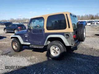 1997 Jeep Wrangler Sport with VIN 1J4FY19S2VP498840, listed as a Copart auction lot 50058885 with 151,697 mi miles and Salvage Title. Bid and sale history available at carsss.com. Image 2.