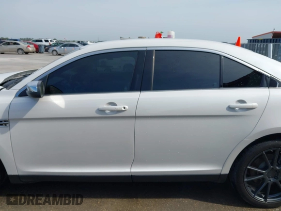 2015 Ford Taurus Limited z VIN 1FAHP2F83FG182936, wystawiony jako IAAI lot #42255917 z przebiegiem 138 966 mil mil oraz . Historia ofert i sprzedaży dostępna na DreamBid. Obrazek 15.