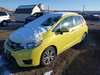 2015 Honda Fit EX-L z VIN 3HGGK5H84FM717976, wystawiony jako IAAI lot #38167874 z przebiegiem 110 963 mil mil oraz . Historia ofert i sprzedaży dostępna na DreamBid. Obrazek 2.