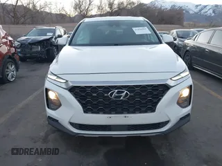 2019 Hyundai Santa Fe SE z VIN 5NMS23AD9KH077362, wystawiony jako IAAI lot #41890584 z przebiegiem 132 476 mil mil oraz . Historia ofert i sprzedaży dostępna na DreamBid. Obrazek 12.
