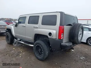 2006 Hummer H3 with VIN 5GTDN136168100264, listed as a IAAI auction lot 41909894 with 136,284 mi miles. Bid and sale history available at carsss.com. Image 3.