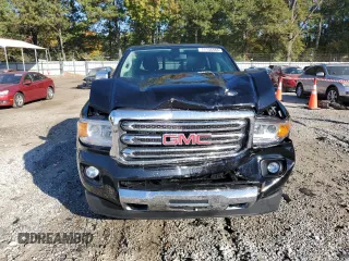 2018 GMC Canyon 4WD SLT with VIN 1GTG6DEN4J1296628, listed as a Copart auction lot 77135484 with 74,486 mi miles and Salvage Title. Bid and sale history available at carsss.com. Image 5.