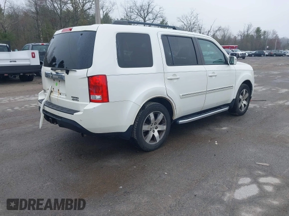 2013 Honda Pilot Touring with VIN 5FNYF4H95DB011661, listed as a IAAI auction lot 42101104 with 298,004 mi miles and . Bid and sale history available at carsss.com. Image 4.