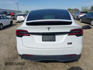 2022 Tesla Model X Plaid z VIN 7SAXCBE6XNF340704, wystawiony jako IAAI lot #41928524 z przebiegiem Nie podano mil oraz . Historia ofert i sprzedaży dostępna na DreamBid. Obrazek 16.