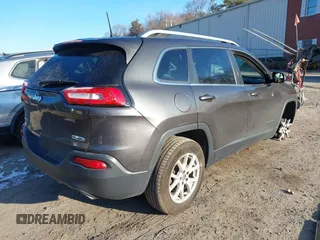 2015 Jeep Cherokee Latitude with VIN 1C4PJMCSXFW725644, listed as a IAAI auction lot 41312764 with 191,714 mi miles and . Bid and sale history available at DreamBid. Image 4.