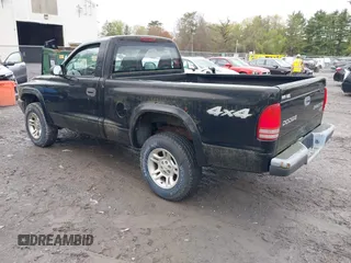 2004 Dodge Dakota with VIN 1D7GG16K44S588932, listed as a IAAI auction lot 42205360 with 77,465 mi miles and . Bid and sale history available at carsss.com. Image 3.