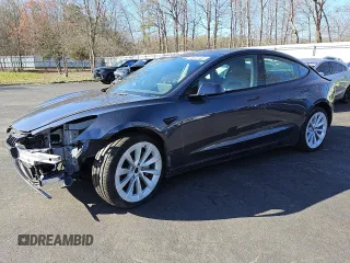 2022 Tesla Model 3 Long Range with VIN 5YJ3E1EBXNF188596, listed as a Copart auction lot 51846915 with 49,271 mi miles and Non Repairable. Bid and sale history available at carsss.com. Image 1.