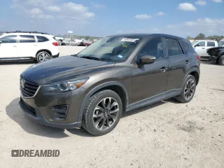 2016 Mazda CX-5 Grand Touring with VIN JM3KE2DY1G0842045, listed as a Copart auction lot 44062505 with 67,779 mi miles and Clean Title. Bid and sale history available at carsss.com. Image 1.