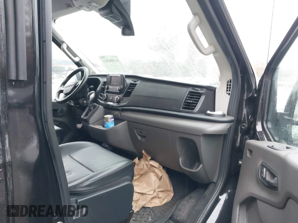 2022 Ford Transit Cargo z VIN 1FTBR3U85NKA64644, wystawiony jako IAAI lot #41006811 z przebiegiem 101 658 mil mil oraz . Historia ofert i sprzedaży dostępna na DreamBid. Obrazek 5.
